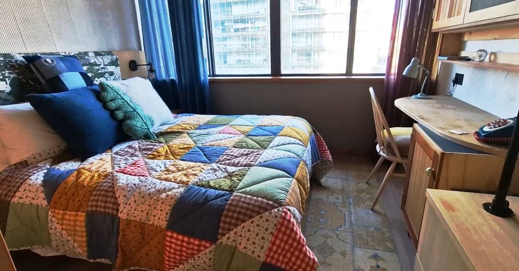 Treehouse Hotel Manchester Hotel Room, patchwork bedding
